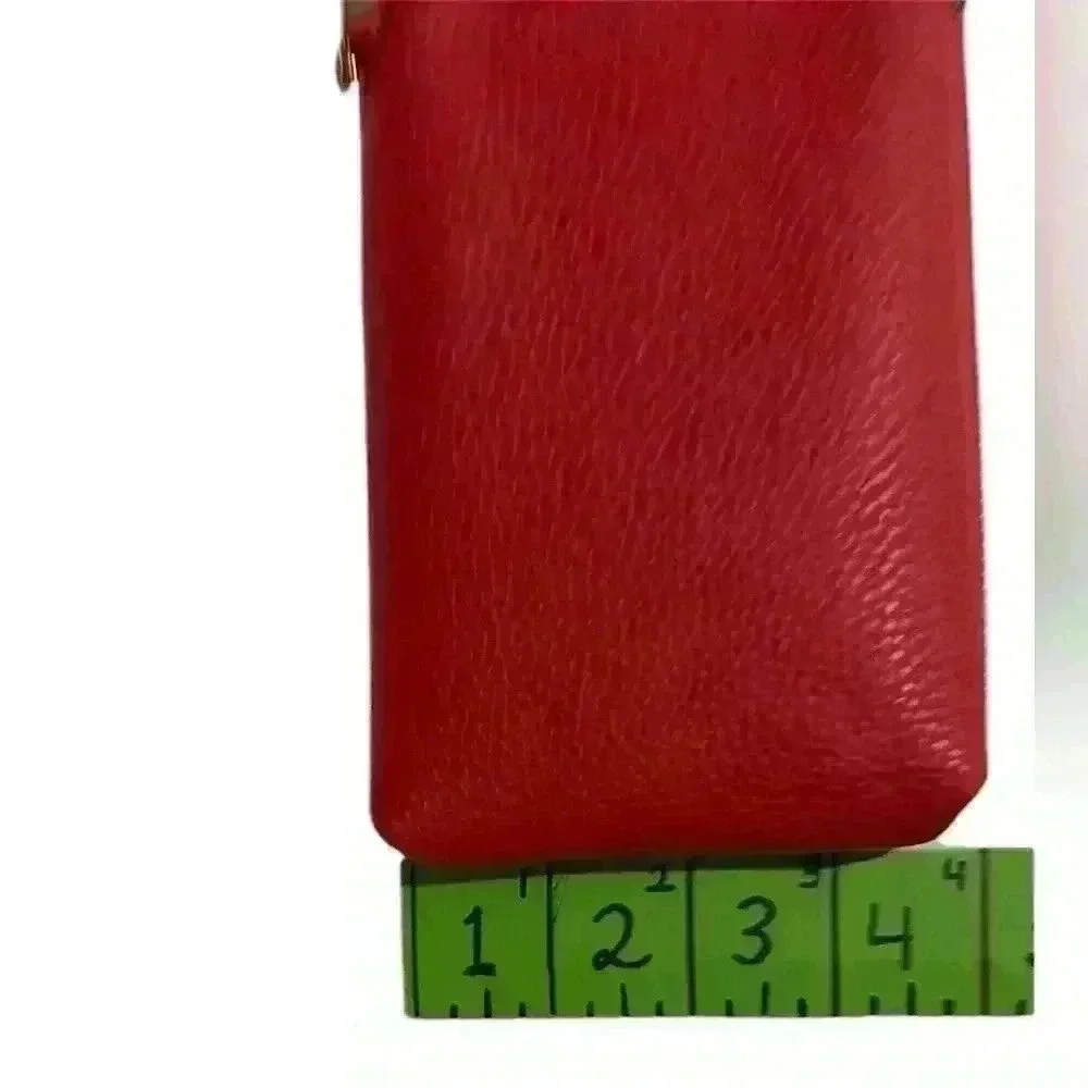 A Forever Young red woman’s,Crossbody bag / wallet with attached iPhone carrier.